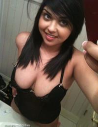Anonymous in lingerie taking a selfie