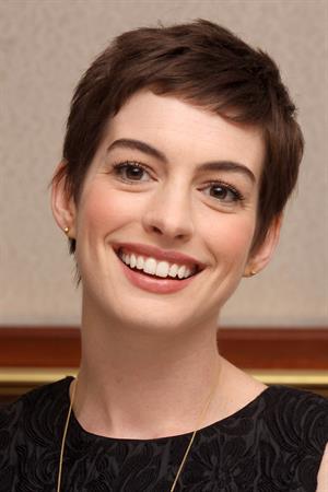Anne Hathaway the Dark Knight Rises press conference portraits in Beverly Hills on July 8, 2012