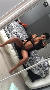 Anonymous in lingerie taking a selfie