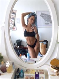 Anonymous in a bikini taking a selfie