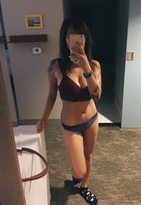 Anonymous in lingerie taking a selfie