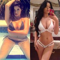 Demi Rose Mawby in a bikini taking a selfie