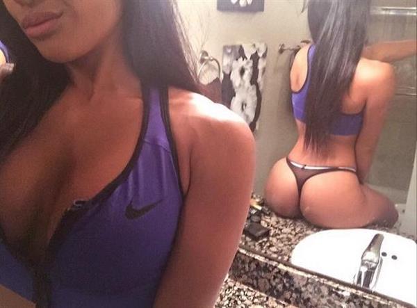 Anonymous in lingerie taking a selfie and - ass
