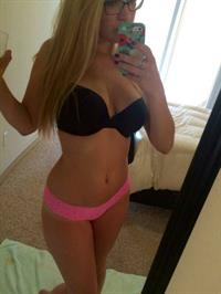 Anonymous in lingerie taking a selfie