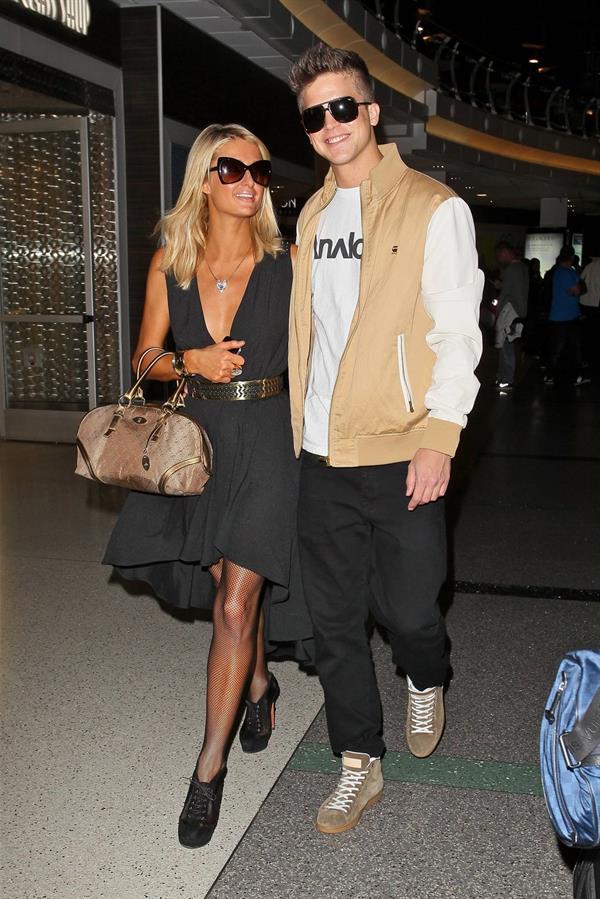 Paris Hilton arrives at LAX on January 25, 2013