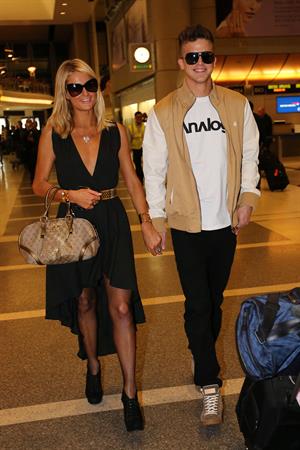 Paris Hilton arrives at LAX on January 25, 2013