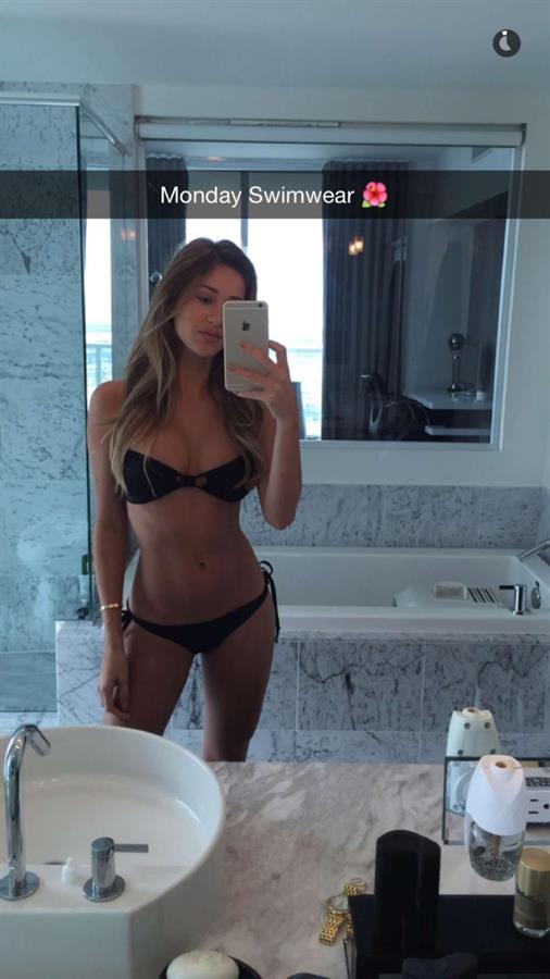 Cindy Prado in a bikini taking a selfie