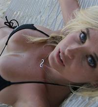 Genevieve Morton in a bikini taking a selfie