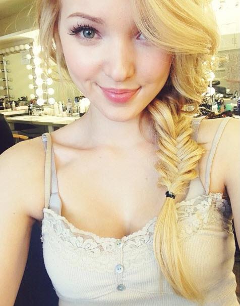 Dove Cameron taking a selfie