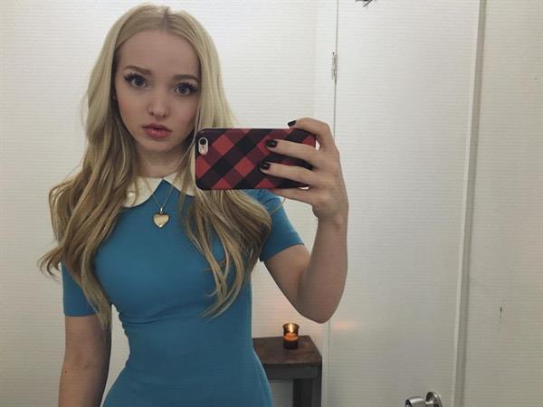 Dove Cameron taking a selfie