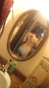 Anonymous in lingerie taking a selfie and - ass