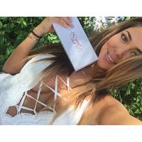 Arianny Celeste in a bikini taking a selfie