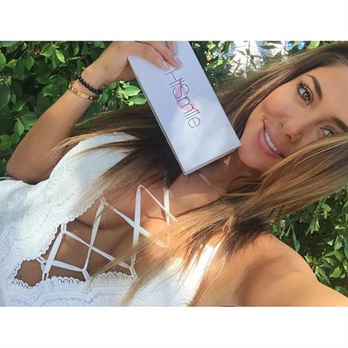 Arianny Celeste in a bikini taking a selfie