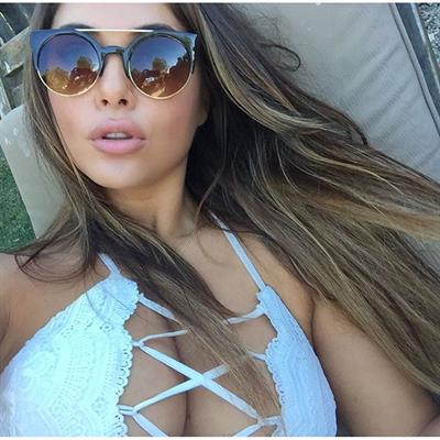 Arianny Celeste in a bikini taking a selfie