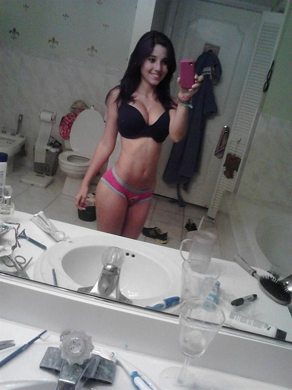 Angie Varona in lingerie taking a selfie