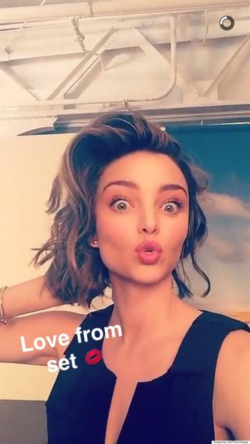 Miranda Kerr taking a selfie