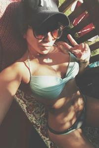 Alicia Michaela in a bikini taking a selfie