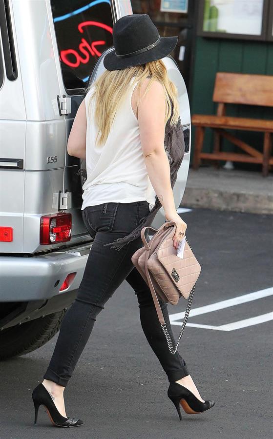 Hilary Duff Out in Los Angeles, August 30, 2012.  She's wearing jeans and a hat