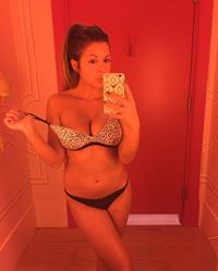 Anonymous in lingerie taking a selfie