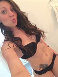 Anonymous in lingerie taking a selfie