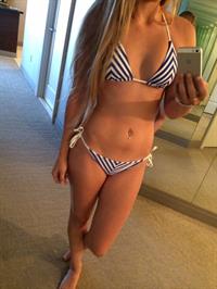 Anonymous in a bikini taking a selfie
