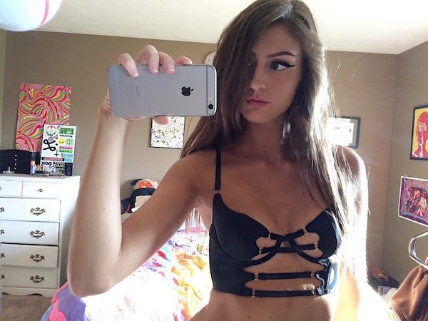 Anonymous in lingerie taking a selfie