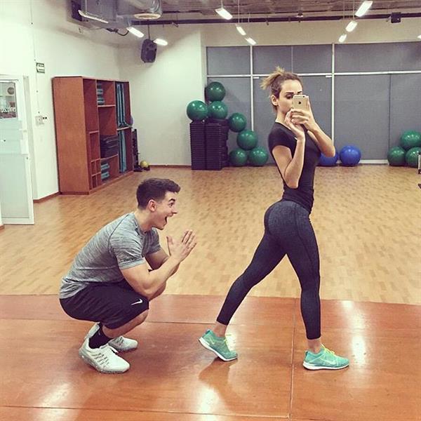Yanet Garcia in Yoga Pants taking a selfie and - ass