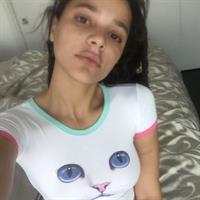 Sasha Lane taking a selfie