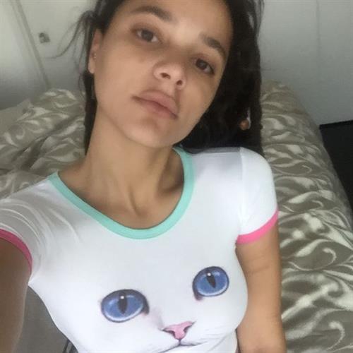 Sasha Lane taking a selfie