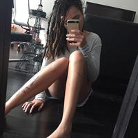 Sasha Lane taking a selfie