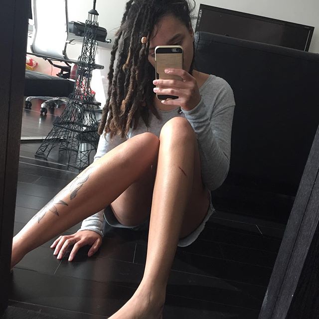Sasha Lane taking a selfie