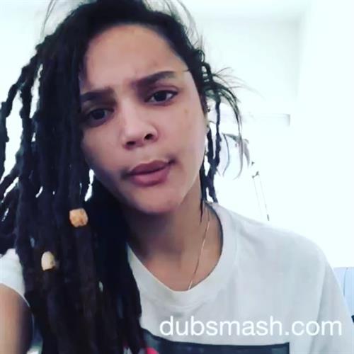 Sasha Lane taking a selfie