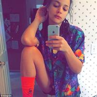 Sasha Lane taking a selfie