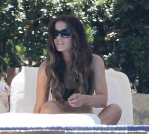 Kate Beckinsale in bikini as she fits in some sunbathing on family holiday in Mexico March 28-2013 