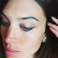Alexa Chung taking a selfie