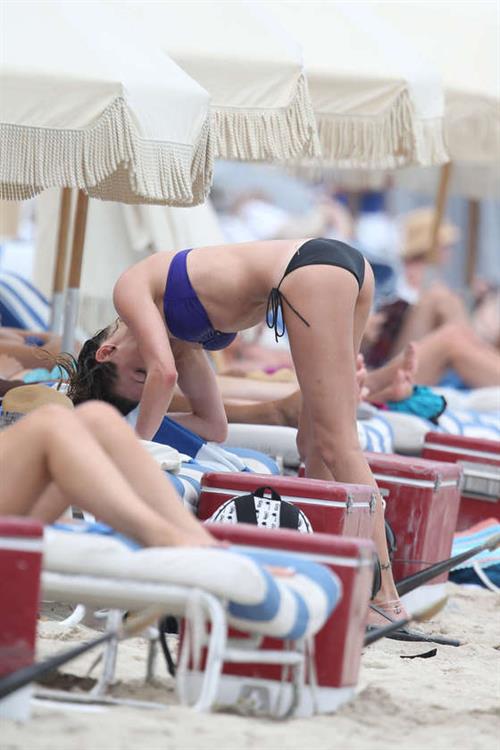 Katie Cassidy in a bikini - ass