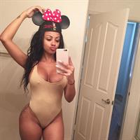 Ana Montana in a bikini taking a selfie