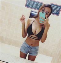 Anonymous in a bikini taking a selfie