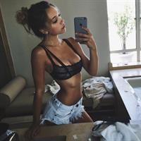 Alexis Ren in lingerie taking a selfie