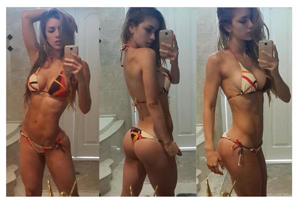 Anllela Sagra in a bikini taking a selfie