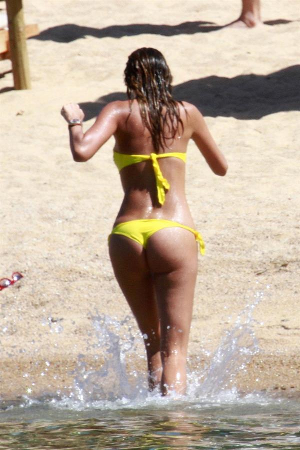 Aida Yespica - Yellow bikini candids in Sardinia on June 18, 2012