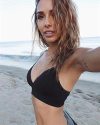 Elisa Michele Maturo in a bikini taking a selfie