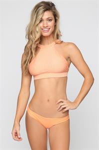 Maggie Rawlins in a bikini