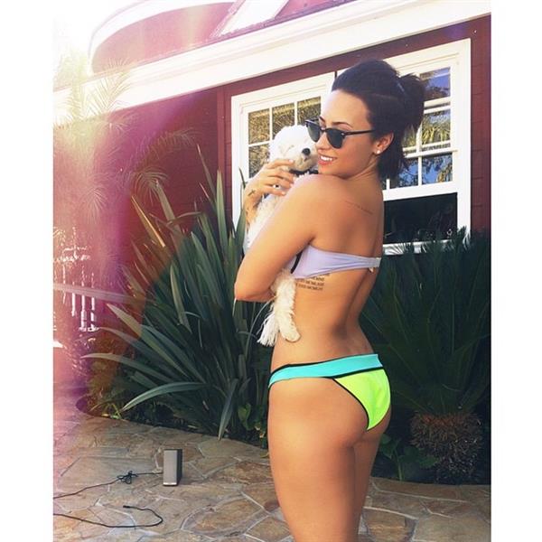 Demi Lovato in a bikini - ass