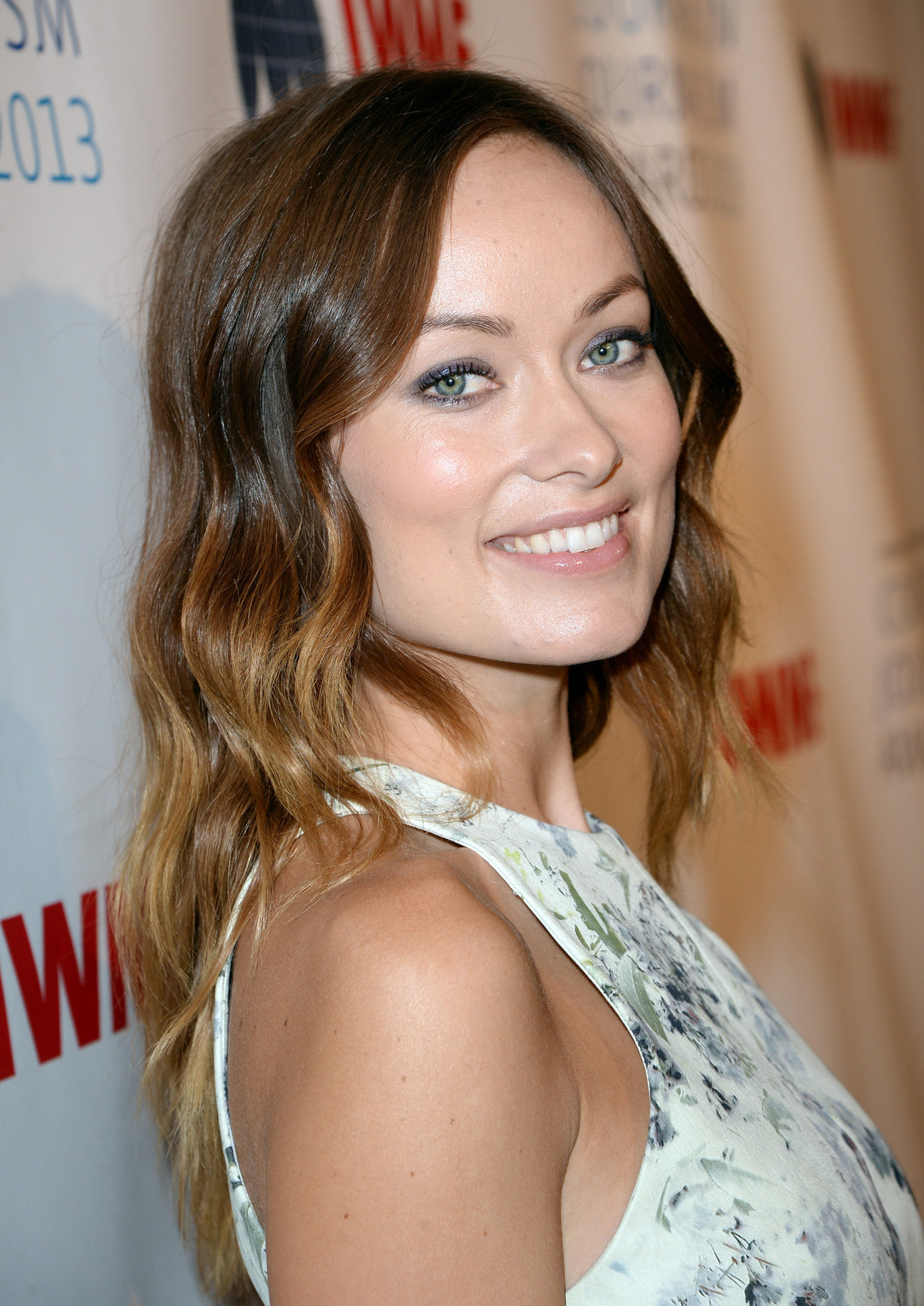Olivia Wilde debuts her small baby bump while attending the 2013 International Women’s Media Foundation’s Courage in Journalism Awards at the Beverly Hills Hotel on Tuesday (October 29, 2013) in Beverly Hills, Calif.