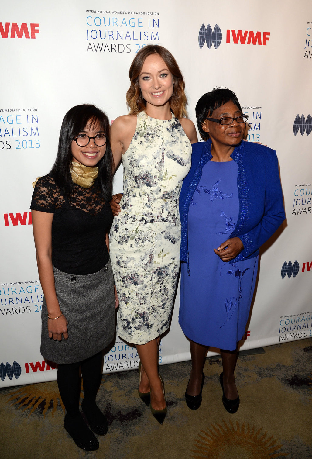 Olivia Wilde debuts her small baby bump while attending the 2013 International Women’s Media Foundation’s Courage in Journalism Awards at the Beverly Hills Hotel on Tuesday (October 29, 2013) in Beverly Hills, Calif.