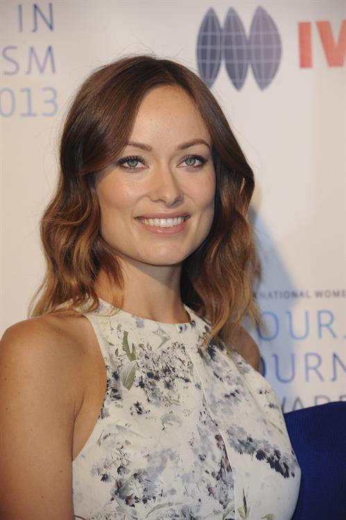 Olivia Wilde debuts her small baby bump while attending the 2013 International Women’s Media Foundation’s Courage in Journalism Awards at the Beverly Hills Hotel on Tuesday (October 29, 2013) in Beverly Hills, Calif.