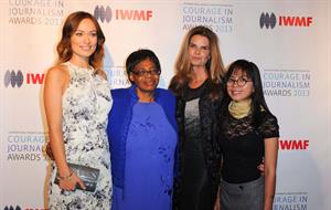 Olivia Wilde debuts her small baby bump while attending the 2013 International Women’s Media Foundation’s Courage in Journalism Awards at the Beverly Hills Hotel on Tuesday (October 29, 2013) in Beverly Hills, Calif.