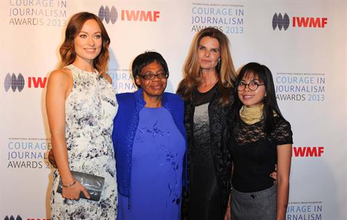 Olivia Wilde Pictures Olivia Wilde debuts her small baby bump while attending the 2013 International Women’s Media Foundation’s Courage in Journalism Awards at the Beverly Hills Hotel on Tuesday (October 29, 2013) in Beverly Hills, Calif.