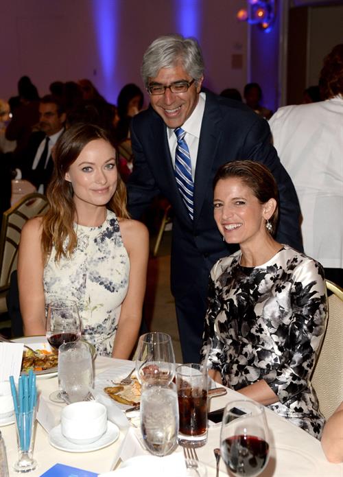 Olivia Wilde Pictures Olivia Wilde debuts her small baby bump while attending the 2013 International Women’s Media Foundation’s Courage in Journalism Awards at the Beverly Hills Hotel on Tuesday (October 29, 2013) in Beverly Hills, Calif.